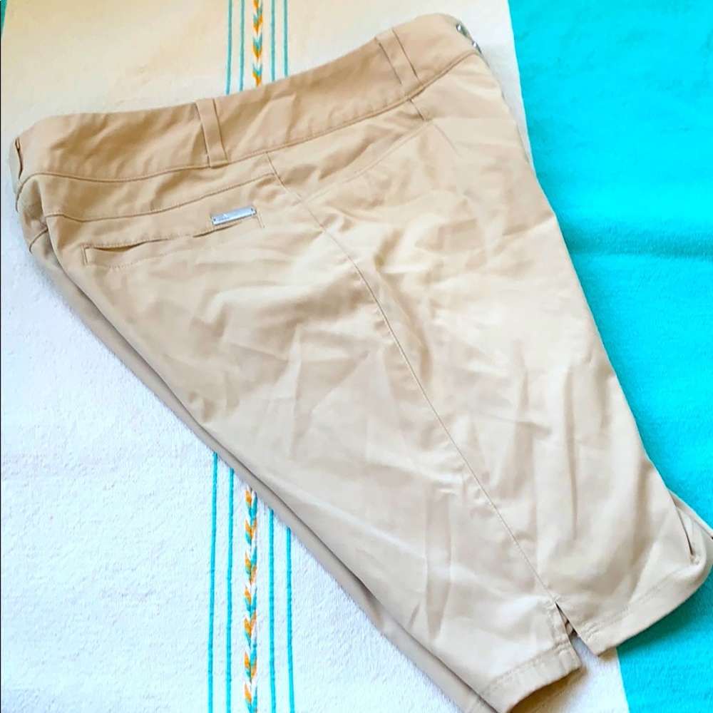 Women’s khaki colored adidas golf shorts size 2